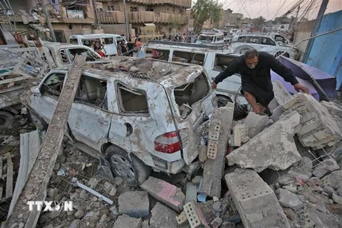 Hiện trường một vụ nổ tại quận Sadr City ở thủ đô Baghdad, Iraq. (Nguồn: AFP/TTXVN)