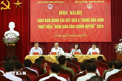 Phó Thủ tướng Trương Hòa Bình và Trưởng Ban Dân vận Trung ương Trương Thị Mai dự Hội nghị. (Ảnh: Doãn Tấn/TTXVN)