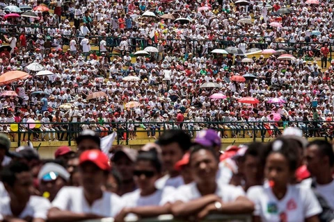 Người dân tham dự một sự kiện trên sân vận động Mahamasina. (Nguồn: AFP)