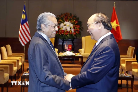Thủ tướng Nguyễn Xuân Phúc và Thủ tướng Malaysia Mahathir Mohamad. (Ảnh: Thống Nhất/TTXVN)