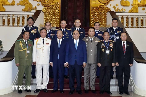 Thủ tướng Nguyễn Xuân Phúc và các Trưởng đoàn dự Hội nghị Tư lệnh Cảnh sát ASEAN lần thứ 39. (Ảnh: Thống Nhất/TTXVN)