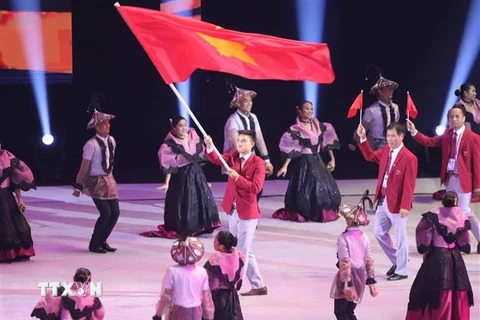 Đoàn thể thao Việt Nam diễu hành tại Lễ khai mạc SEA Games 30, một kỳ SEA Games hết sức thành công của thể thao Việt Nam. (Ảnh: TTXVN)