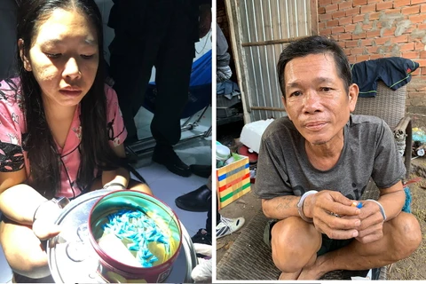 Hai đối tượng Lương Thị Bích Chi và Lương Văn Nhân bị bắt giữ cùng tang vật. (Nguồn: baodongnai.com.vn)
