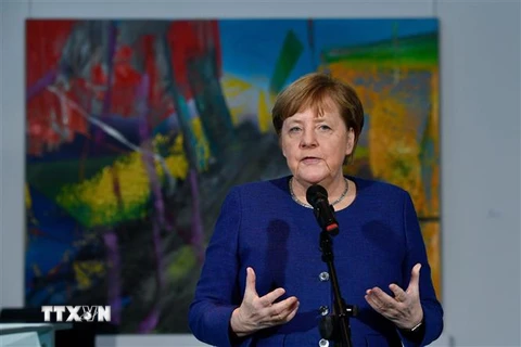 Thủ tướng Đức Angela Merkel phát biểu tại cuộc họp về ảnh hưởng của dịch COVID-19 tới kinh tế và xã hội ở Berlin, ngày 13/3. (Ảnh: AFP/TTXVN)