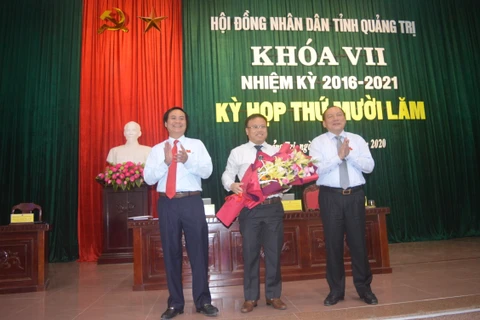 Ông Võ Văn Hưng (trái) tại phiên họp HĐND tỉnh Quảng Trị ngày 9/6. (Nguồn: baochinhphu.vn)