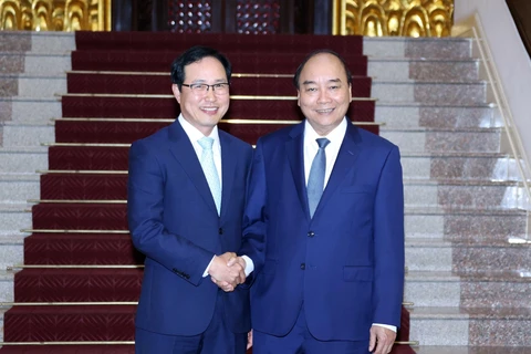 Thủ tướng Nguyễn Xuân Phúc tiếp ông Choi Joo Ho, Tổng giám đốc Tổ hợp Samsung Việt Nam. (Ảnh: Thống Nhất/TTXVN)