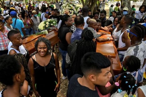 Đám tang của các thanh niên bị sát hại. (Nguồn: Getty Images)