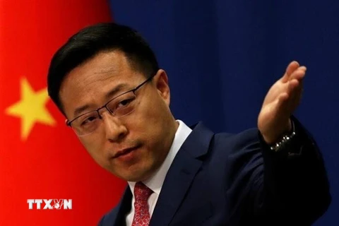 Người phát ngôn Bộ ngoại giao Trung Quốc Triệu Lập Kiên trong một cuộc họp báo tại thủ đô Bắc Kinh. (Ảnh: IRNA/TTXVN)