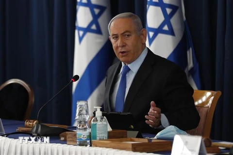Thủ tướng Israel Benjamin Netanyahu phát biểu trong một cuộc họp Nội các ở Jerusalem. (Ảnh: AFP/TTXVN)