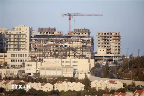 Các tòa nhà đang được xây dựng tại khu định cư Efrat ở thành phố Bethlehem, Bờ Tây. (Ảnh: AFP/TTXVN)
