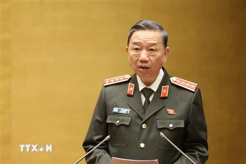 Bộ trưởng Bộ Công an Tô Lâm trình bày Tờ trình về dự án Luật Phòng, chống ma túy (sửa đổi). (Ảnh: Dương Giang/TTXVN)