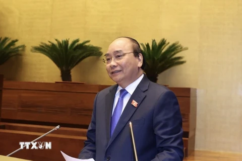 Thủ tướng Nguyễn Xuân Phúc trả lời chất vấn trước Quốc hội. (Ảnh: Thống Nhất/TTXVN)