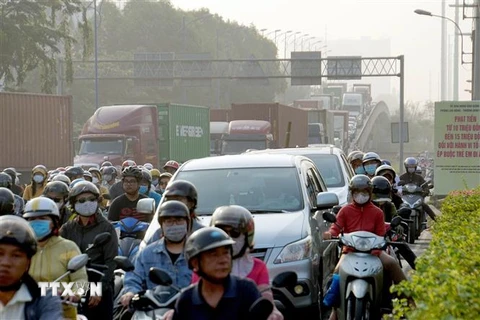 Hoạt động giao thông cũng là một trong những tác nhân làm phát thải nhà kính vượt ngưỡng tại Thành phố Hồ Chí Minh hiện nay. (Ảnh: Tiến Lực/TTXVN)