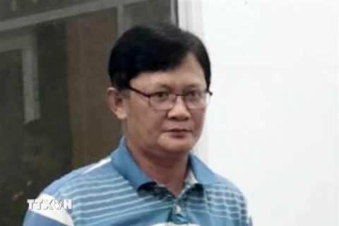 Bị can Huỳnh Hồng Bảo tại thời điểm bị bắt. (Ảnh: TTXVN phát)