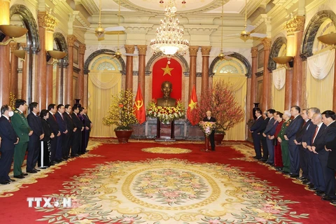 Tổng Bí thư, Chủ tịch nước Nguyễn Phú Trọng và Thủ tướng Nguyễn Xuân Phúc với các lãnh đạo và nguyên lãnh đạo Đảng, Nhà nước. (Ảnh: Trí Dũng/TTXVN)