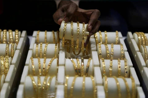 Giá vàng thế giới phiên 15/4 chạm mức mức cao nhất trong hơn 1 tháng. (Nguồn: Reuters)