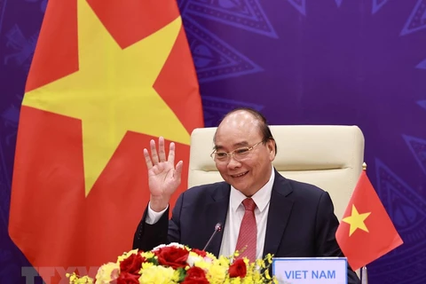 Chủ tịch nước Nguyễn Xuân Phúc phát biểu tại điểm cầu Hà Nội. (Ảnh: Thống Nhất/TTXVN)