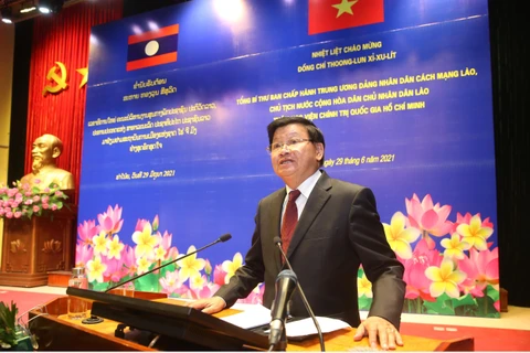 Tổng Bí thư, Chủ tịch nước Lào Thongloun Sisoulith nói chuyện với cán bộ, giảng viên, học viên Học viện Chính trị Quốc gia Hồ Chí Minh. (Ảnh: Lâm Khánh/TTXVN)