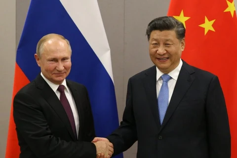 Tổng thống Nga Vladimir Putin và Tổng Bí thư Đảng Cộng sản Trung Quốc Tập Cận Bình. (Nguồn: eturbonews.com)