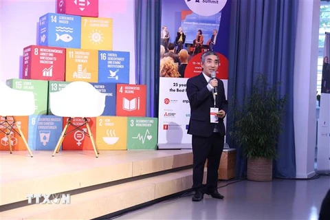 Tiến sỹ Nguyễn Mạnh Hải với tham luận Chính sách khuyến khích đầu tư cho tăng trưởng xanh. (Ảnh: Phương Hoa/TTXVN)