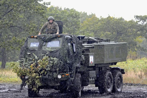 Xe quân sự của Mỹ tham gia tập trận. (Nguồn: Kyodo)