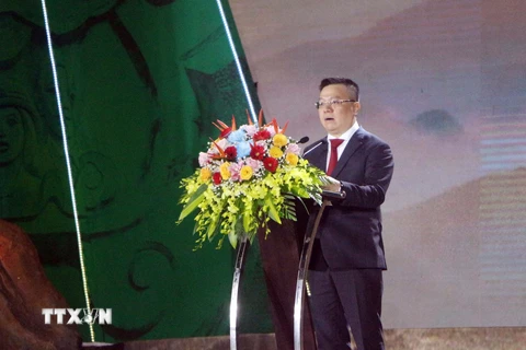 Tổng Biên tập Báo Nhân dân, Chủ tịch Hội Nhà báo Việt Nam Lê Quốc Minh phát biểu khai mạc chương trình. (Ảnh: Tá Chuyên/TTXVN)