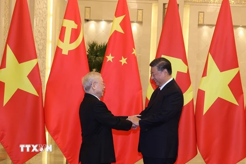 Tổng Bí thư, Chủ tịch Trung Quốc Tập Cận Bình đón Tổng Bí thư Nguyễn Phú Trọng. (Ảnh: Trí Dũng/TTXVN)