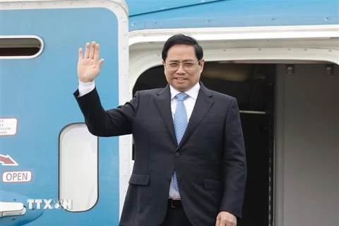 Thủ tướng Phạm Minh Chính tại Sân bay Quốc tế Nội Bài. (Ảnh: Dương Giang/TTXVN)