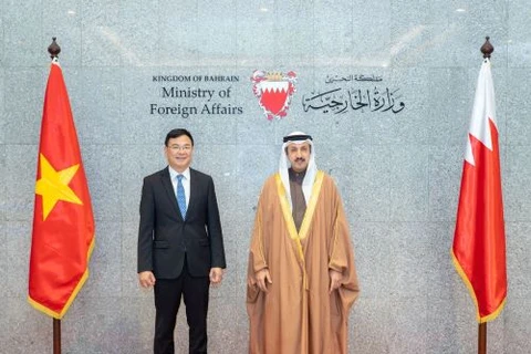 Thứ trưởng Bộ Ngoại giao Phạm Quang Hiệu và Thứ trưởng Bộ Ngoại giao Bahrain Hoàng thân Abdulla bin Ahmed Al Khalifa. (Nguồn: Bộ Ngoại giao Việt Nam)