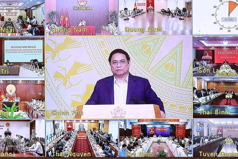 Thủ tướng Phạm Minh Chính chủ trì hội nghị trực tuyến đẩy mạnh giải ngân vốn đầu tư công năm 2023. (Ảnh: Dương Giang/TTXVN)