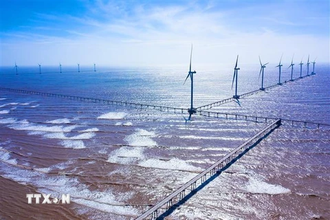 Nhà máy Điện gió Đông Hải I tại Trà Vinh, quy mô 25 trụ gió, tổng công suất 100MW, khánh thành ngày 16/1/2022. (Ảnh: TTXVN)