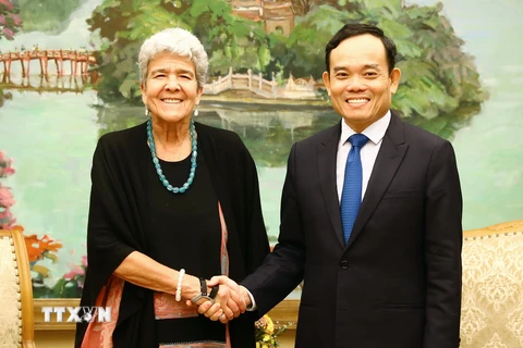 Phó Thủ tướng Trần Lưu Quang tiếp Thứ trưởng Bộ Thương mại Hoa Kỳ Marisa Lago. (Ảnh: Lâm Khánh/TTXVN)