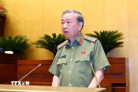 Đại tướng Tô Lâm, Bộ trưởng Bộ Công an, giải trình, làm rõ một số vấn đề đại biểu Quốc hội nêu. (Ảnh: Phạm Kiên/TTXVN)