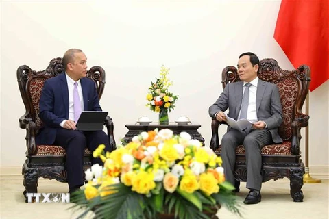 Phó Thủ tướng Trần Lưu Quang tiếp Giám đốc điều hành Văn phòng nhóm Ngân hàng Thế giới phụ trách khu vực Đông Nam Á Wempi Saputra. (Ảnh: An Đăng/TTXVN)