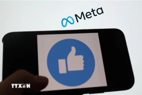Biểu tượng của Meta trên màn hình máy tính. (Ảnh: AFP/TTXVN)