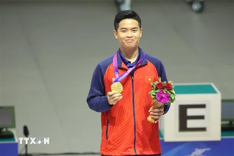 Xạ thủ Phạm Quang Huy giành huy chương Vàng tại ASIAD 2023. (Ảnh: TTXVN phát)
