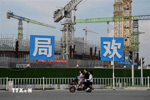 Các tòa nhà đang xây dựng của Tập đoàn Phát triển Bất động sản Evergrande ở Quảng Đông, Trung Quốc. (Ảnh: AFP/TTXVN)