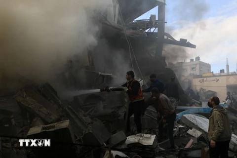 Cảnh đổ nát sau vụ oanh tạc của Israel xuống Dải Gaza ngày 14/12. (Nguồn: THX/TTXVN) 