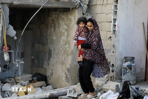 Cảnh đổ nát sau các cuộc không kích của Israel tại Rafah, Dải Gaza, ngày 29/12. (Ảnh: THX/TTXVN)