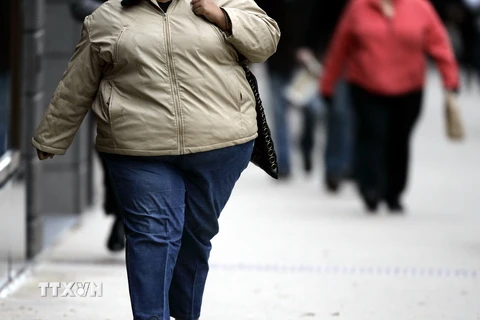Một phụ nữ bị mắc bệnh béo phì tại Chicago, bang Illinois, Mỹ. (Ảnh: AFP/TTXVN )