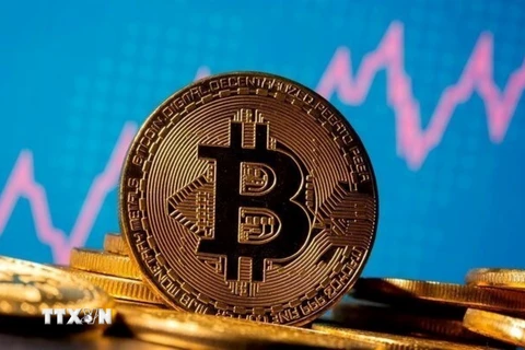 Đồng tiền kỹ thuậ số Bitcoin. (Ảnh: REUTERS/TTXVN)