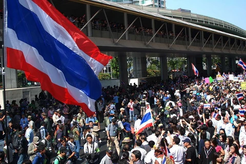 Người biểu tình phản đối chính phủ ở Bangkok ngày 21/1. (Ảnh: THX/TTXVN)