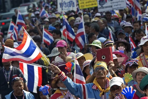 Người biểu tình chống Chính phủ tại Bangkok ngày 17/1 vừa qua. (Ảnh: AFP/TTXVN)