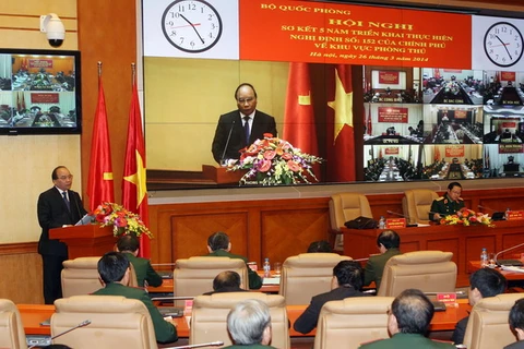 Ủy viên Bộ Chính trị, Phó Thủ tướng Chính phủ Nguyễn Xuân Phúc đến dự và phát biểu tại Hội nghị. (Ảnh: Trọng Đức/TTXVN)