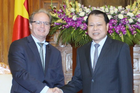 Phó Thủ tướng Vũ Văn Ninh tiếp Phó Chủ tịch WB Axel Van Trotsenburg. (Ảnh: Lâm Khánh/TTXVN)