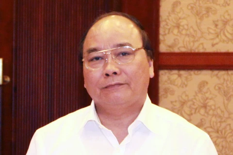 Phó Thủ tướng Nguyễn Xuân Phúc. (Ảnh: Nguyễn Dân/TTXVN)