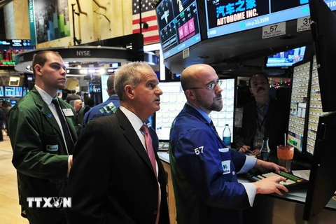 Tại một sàn giao dịch cổ phiếu New York. (Ảnh; AFP/TTXVN)