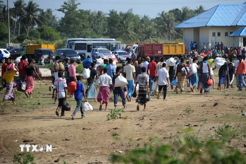 Người di cư gồm những người Bangladesh và người Hồi giáo Rohingya. (Ảnh: AFP/TTXVN)