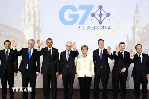 Các lãnh đạo G7 và đại diện Liên minh châu Âu tại hội nghị diễn ra tại Brussels (Bỉ) vào tháng 6/2014. (Ảnh: AFP/TTXVN)