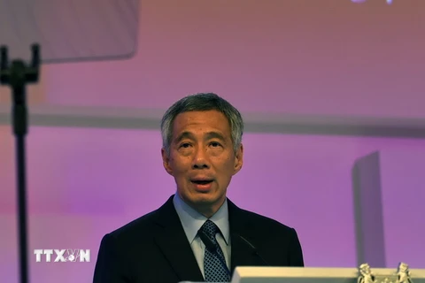 Thủ tướng Singapore Lý Hiển Long phát biểu tại lễ khai mạc hội nghị. (Ảnh: AFP/TTXVN)